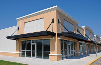 Photo of the exterior of a freshly painted commercial building